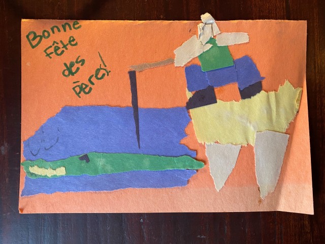 child's handmade card depicting a crocodile and a figure poking it with a stick